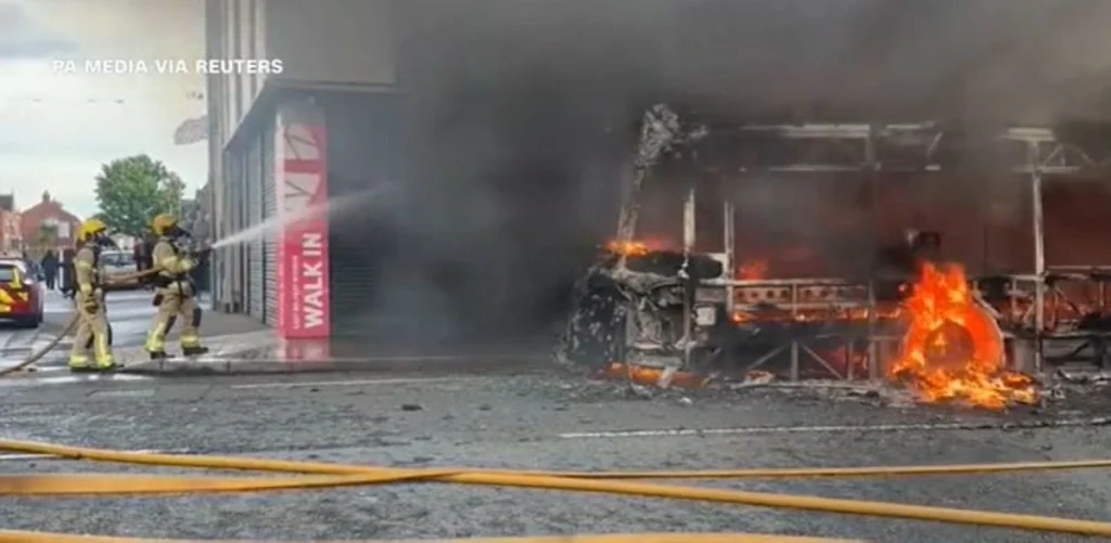 Vehicles and homes set alight as anti-immigration violence flares over Northern Ireland knife attack