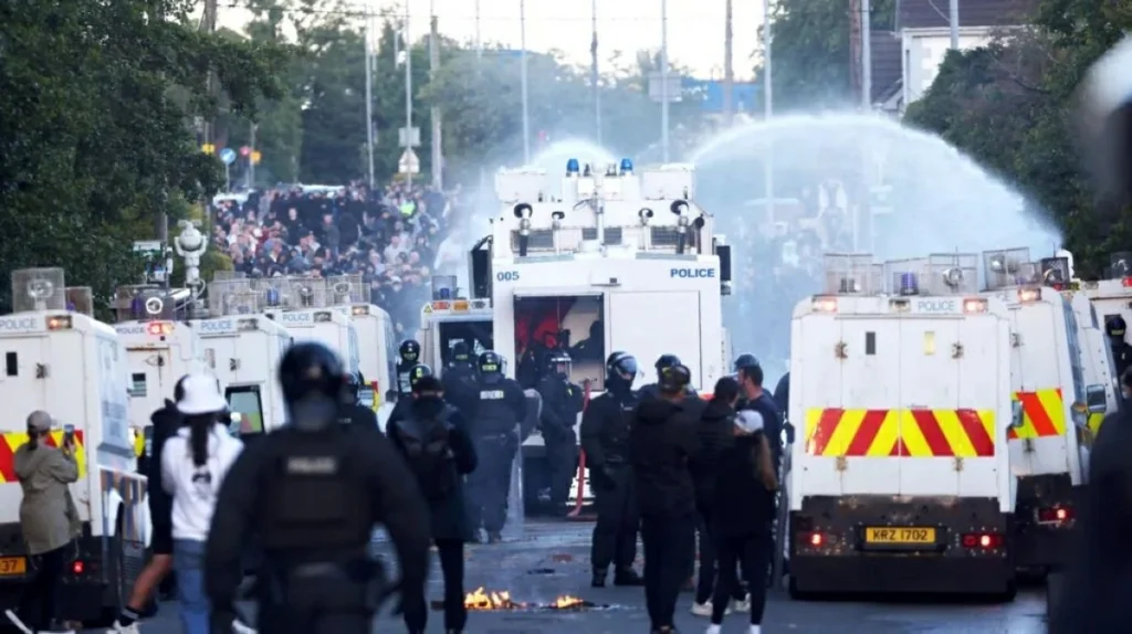 Water cannon fired to disperse Belfast rioters as violence erupts for second night