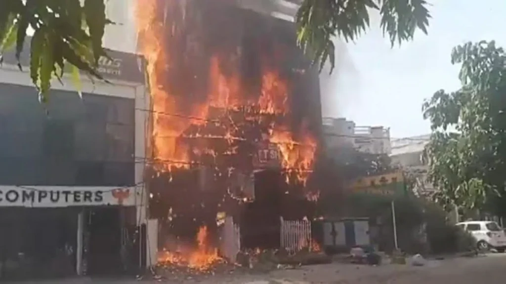 At least 14 dead as massive fire rips through training center in north Indian city