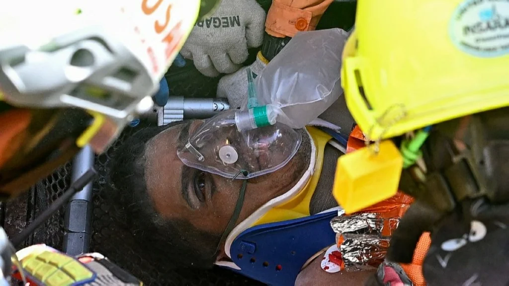 Rescuers save trapped security guard from mall rubble eight days after Venezuela quakes
