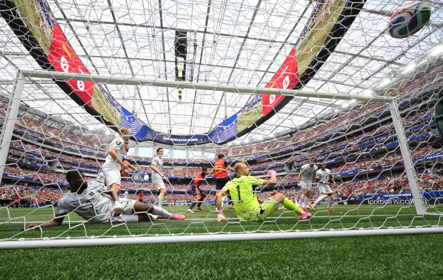 Spain beat Austria to reach World Cup Round of 16