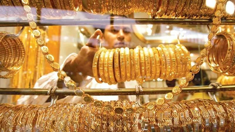 Gold retreats after scaling over 2-month peak