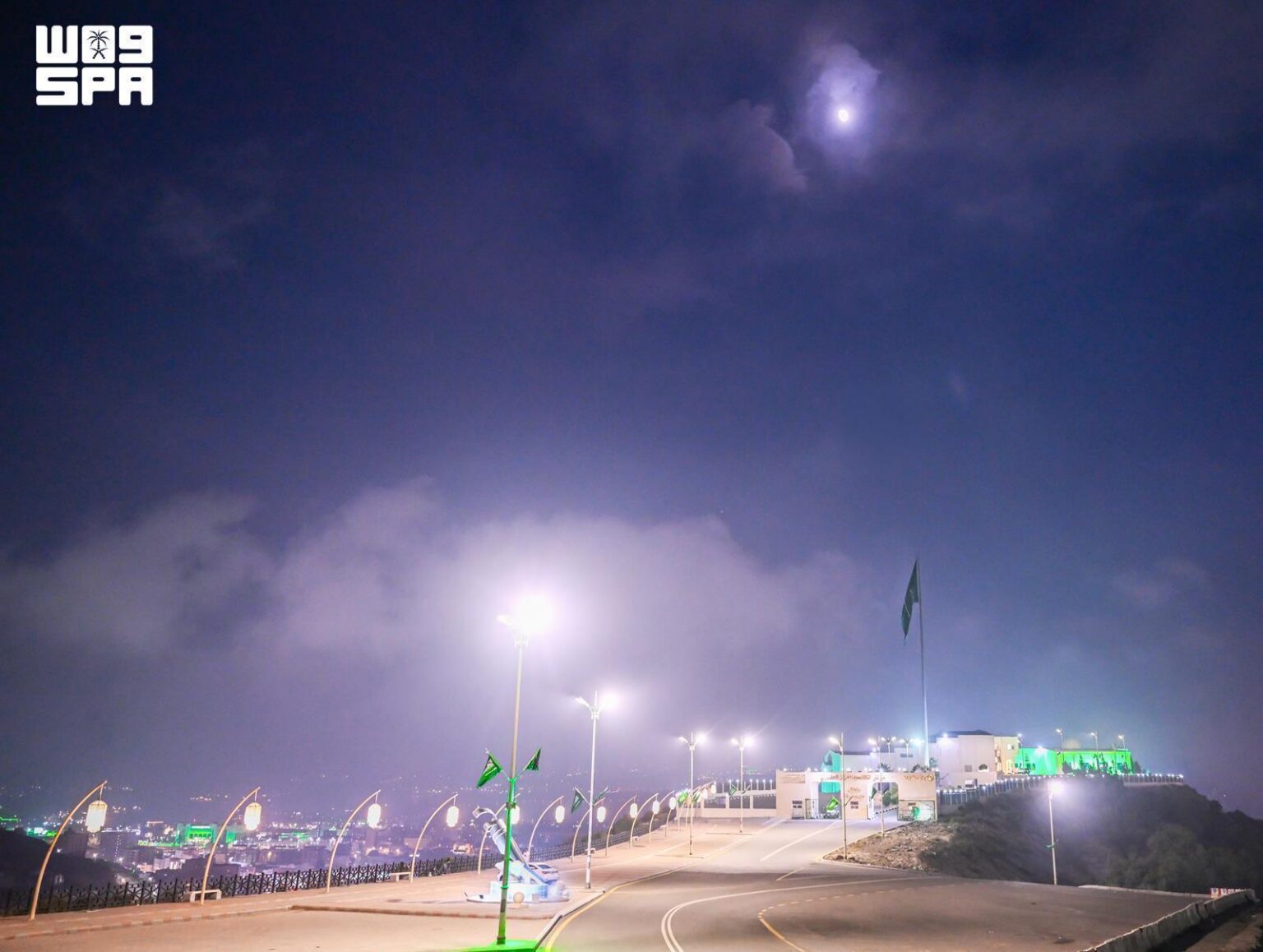 Saudi Flag Soars Amid Fog in Al-Baha Skies on National Day