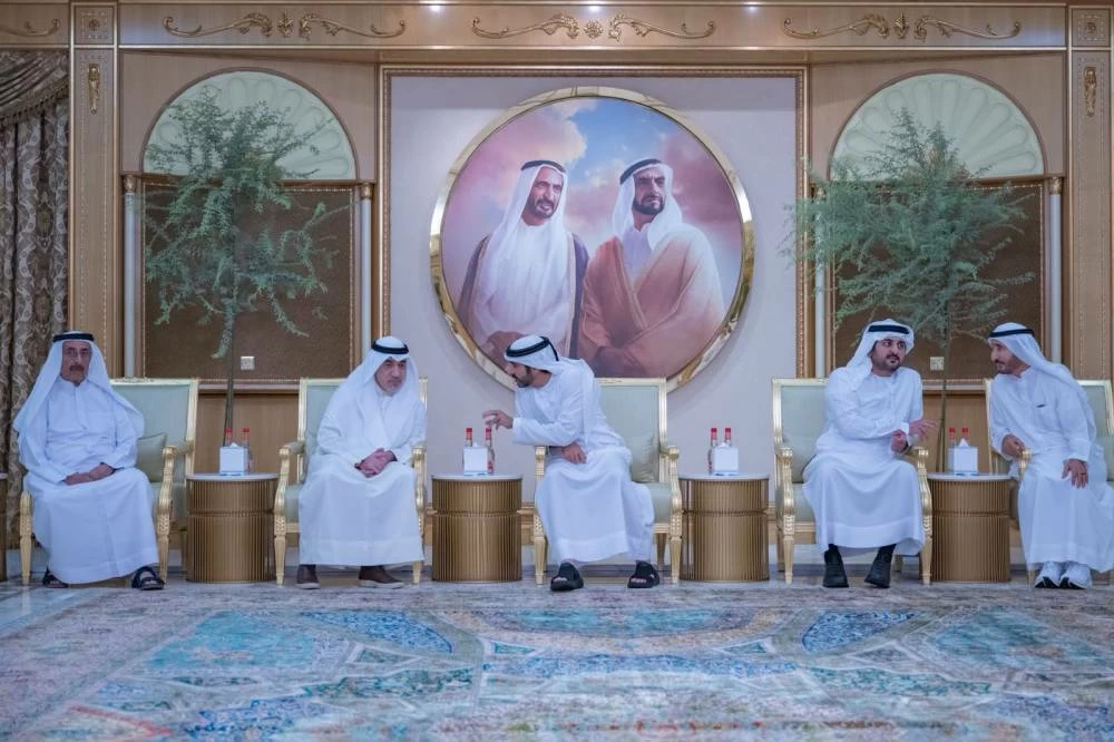 Hamdan bin Mohammed, alongside Maktoum bin Mohammed and Ahmed bin Mohammed, receive condolences for the death of Ahmed bin Rashid