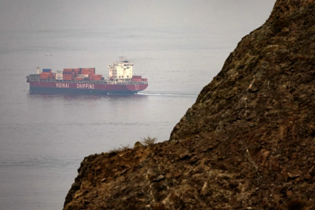Container ship sinks near Hormuz after being hit by unknown projectile